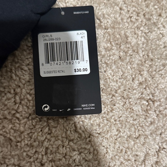 Nike Kids Black Leggings with White Speckles and Neon Green Logo - Picture 2 of 5